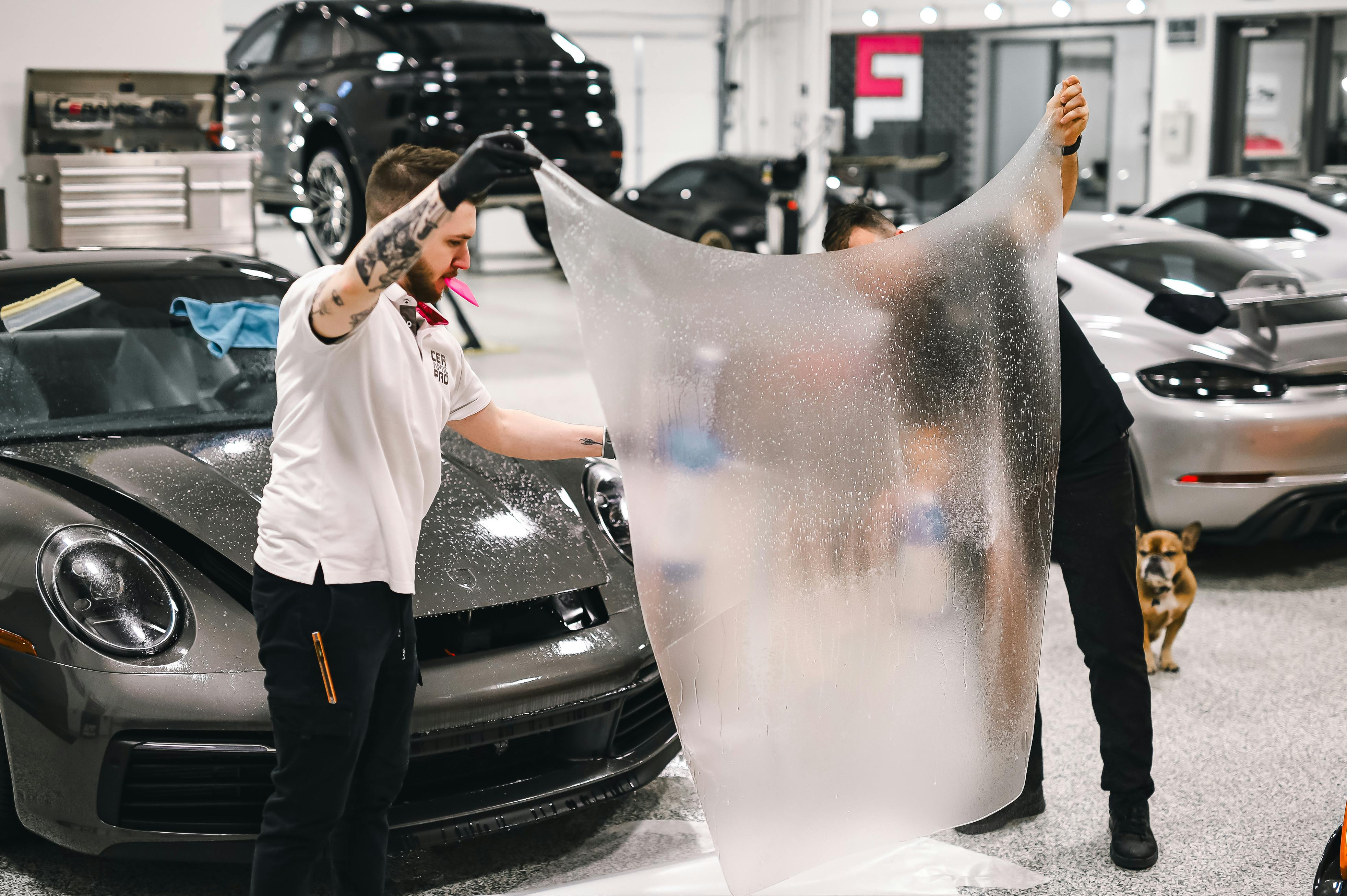 Applying paint protection film in a workshop